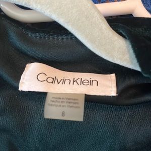 Calvin Klein velvet dress, with gold detail.